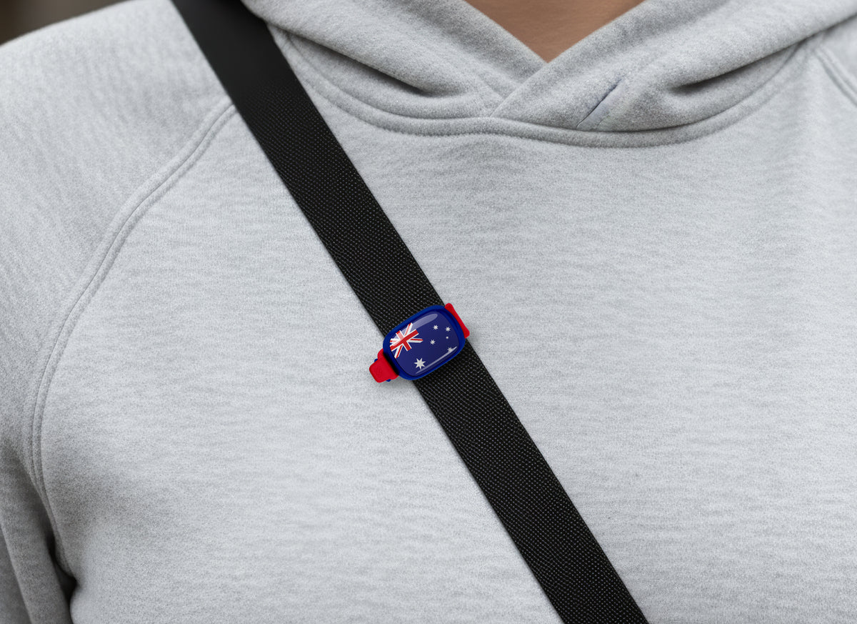 Australia flag Stwrap bag tag shown on a bag in a lifestyle setting