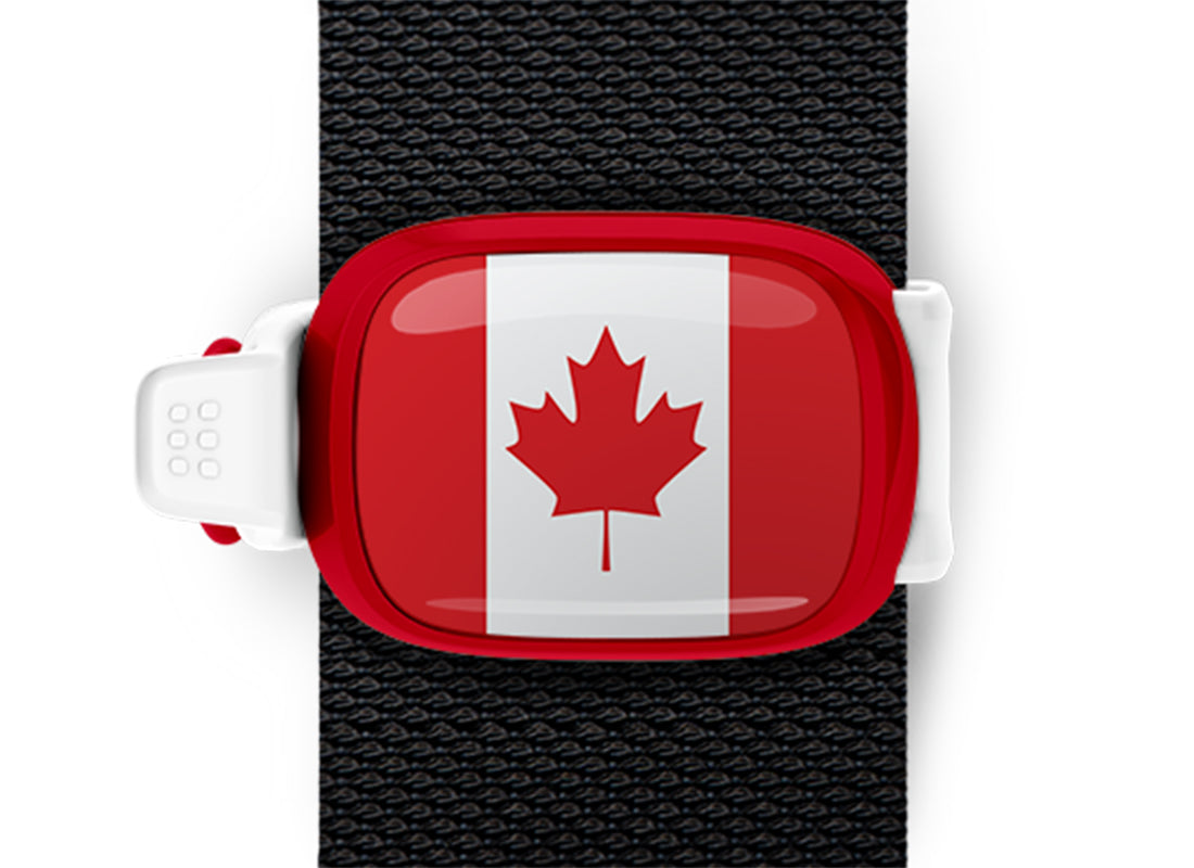 Canada flag Stwrap bag tag mounted on a bag strap