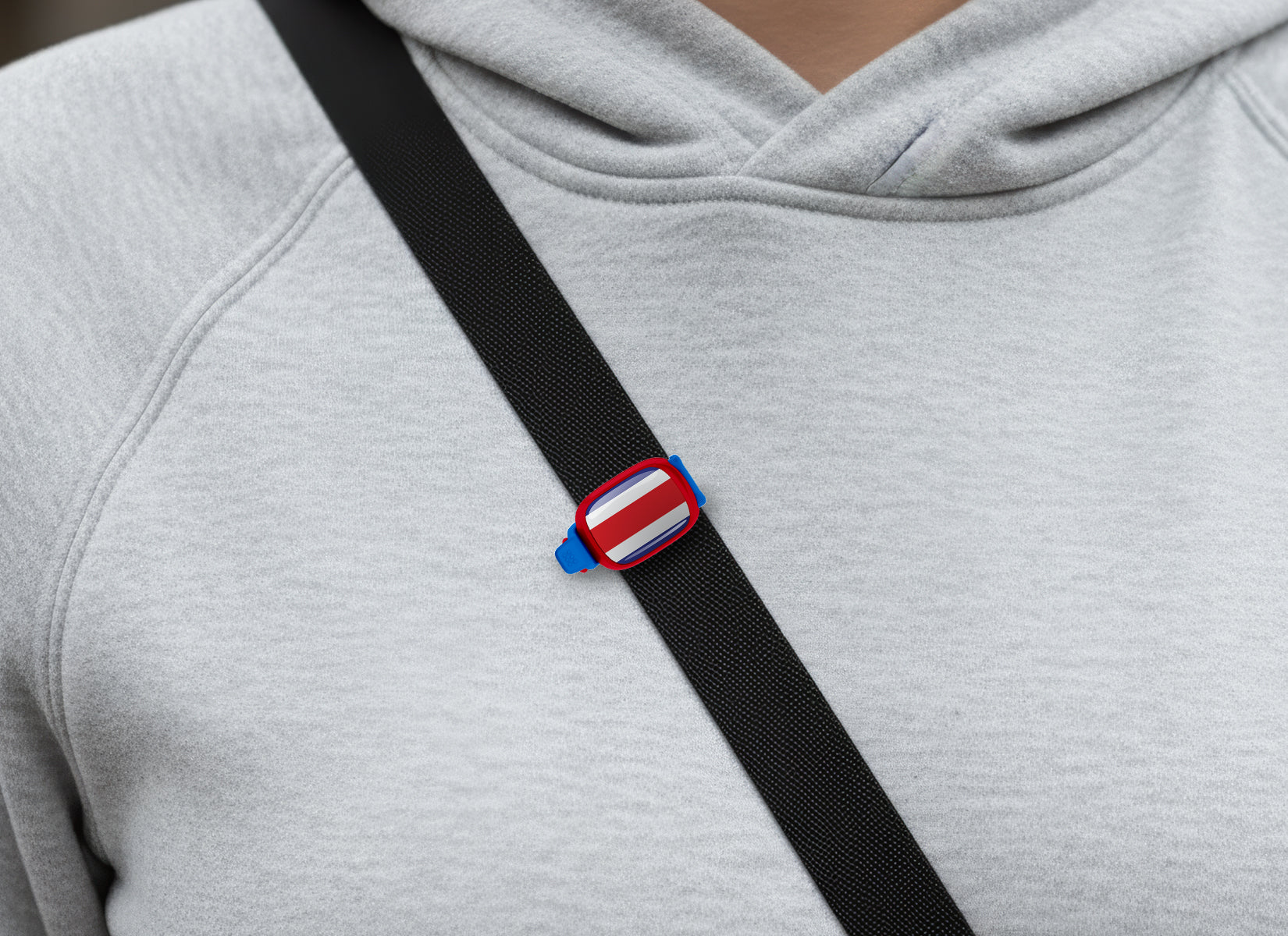 Costa Rica flag Stwrap bag tag shown on a bag in a lifestyle setting