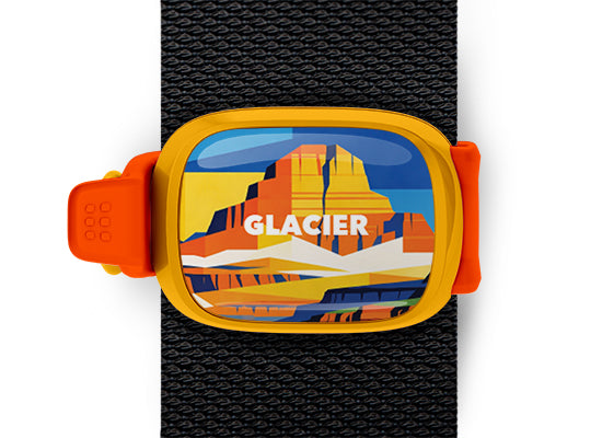 Glacier National Park Stwrap bag tag mounted on a black bag strap