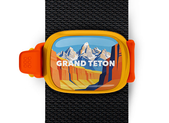 Grand Teton National Park Stwrap bag tag mounted on a black bag strap