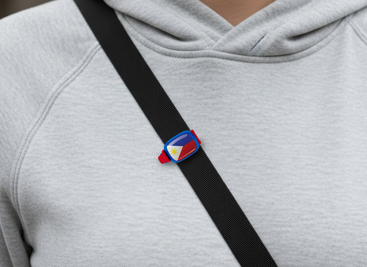 Philippines flag Stwrap bag tag shown on a bag in a lifestyle setting