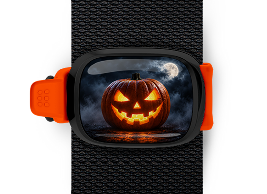 Glowing Jack O Lantern Stwrap Halloween bag tag mounted on a black strap