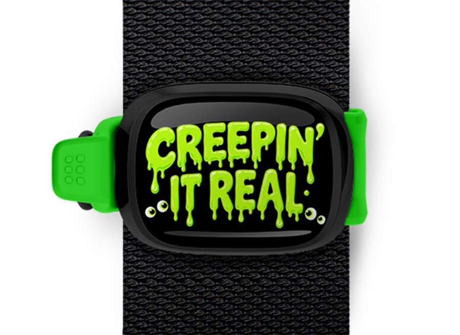 Creepin' It Real Stwrap Halloween bag tag mounted on a black strap