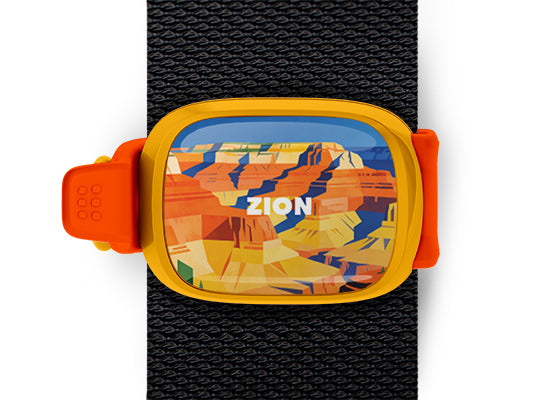 Zion National Park Stwrap bag tag mounted on a black bag strap