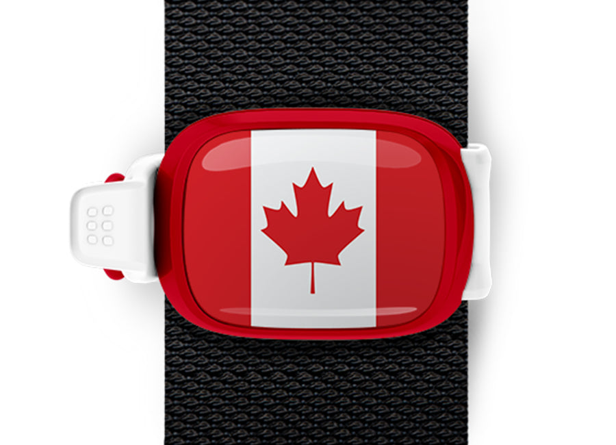Canada flag Stwrap bag tag mounted on a bag strap