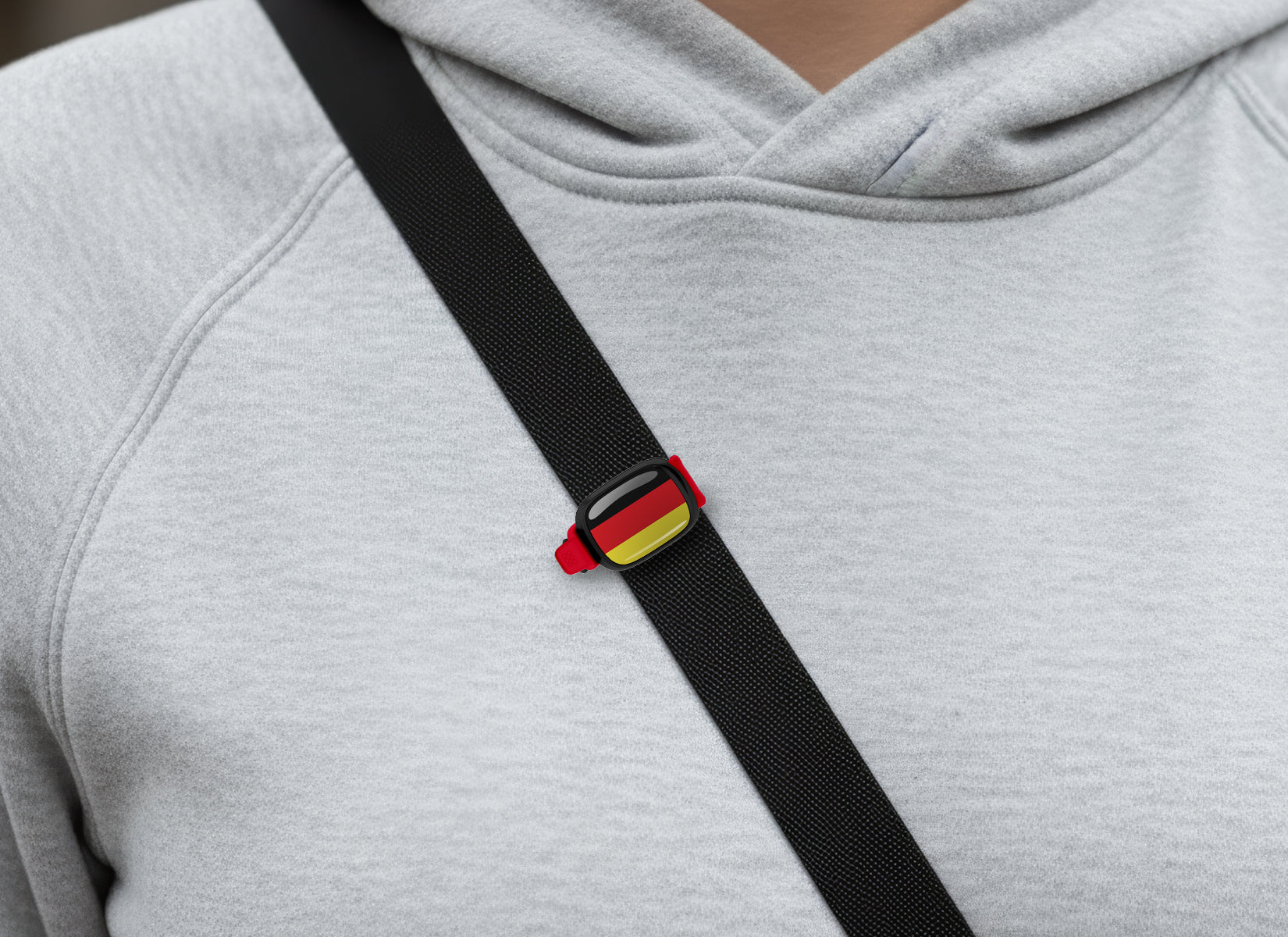Germany flag Stwrap bag tag shown on a bag in a lifestyle setting