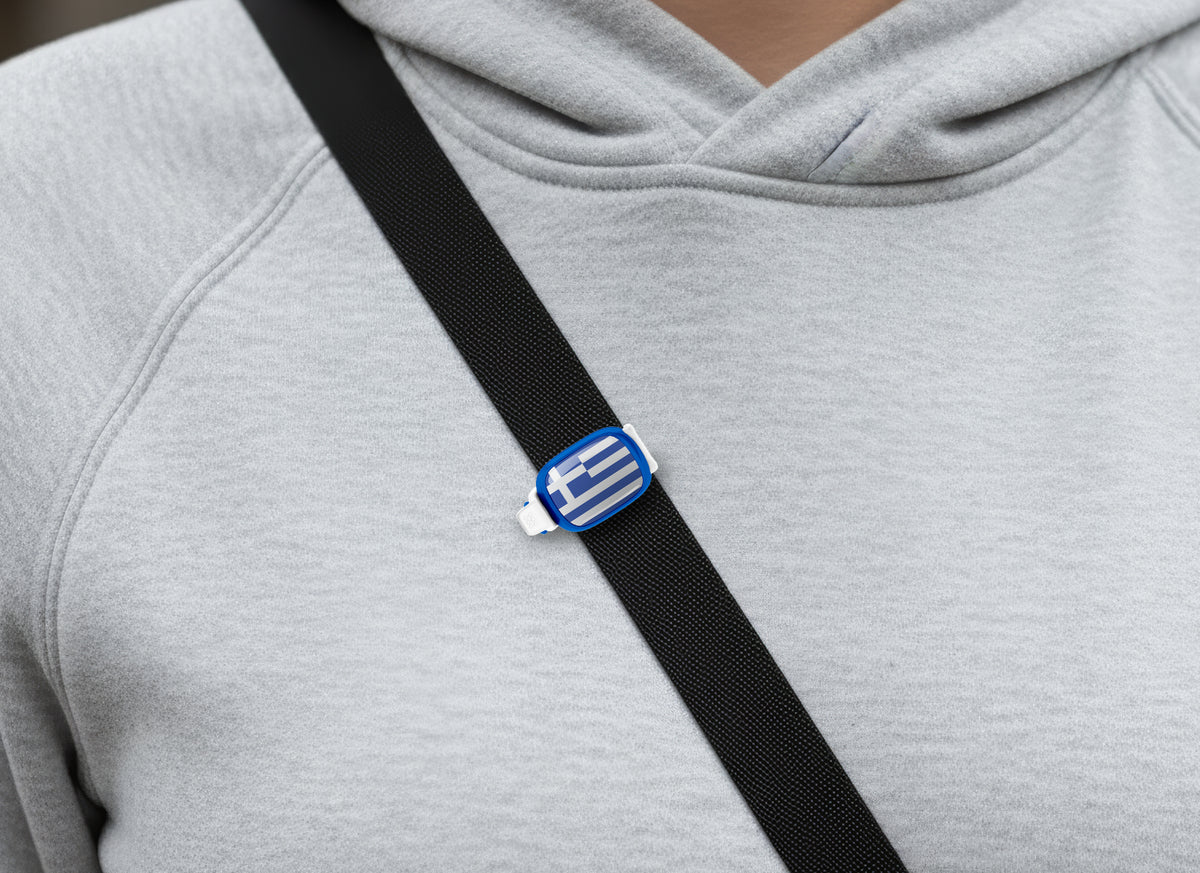 Greece flag Stwrap bag tag shown on a bag in a lifestyle setting