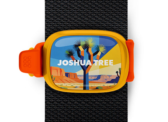 Joshua Tree National Park Stwrap bag tag mounted on a black bag strap