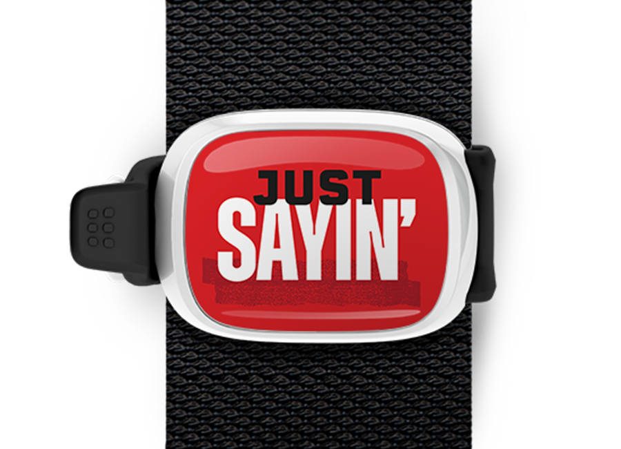 Just Sayin Bag Tag mounted on a bag strap