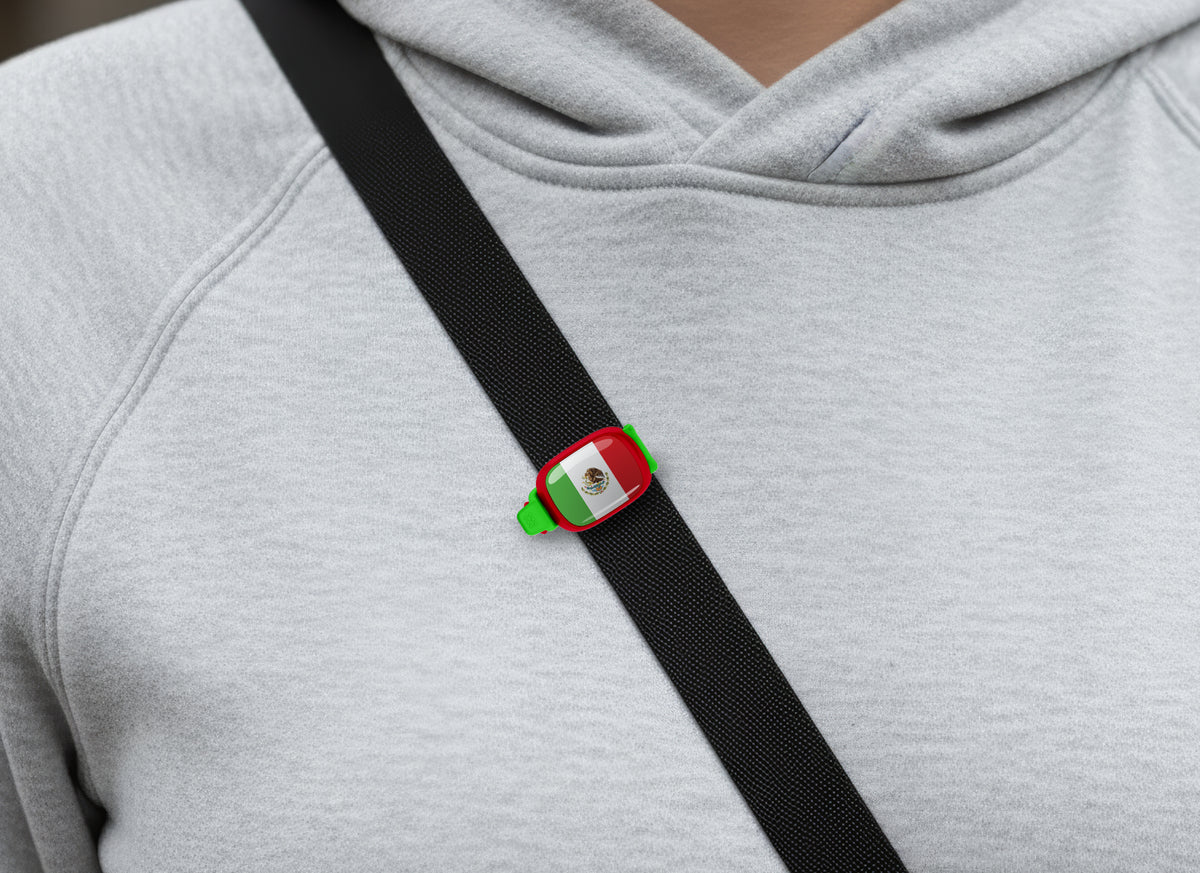 Mexico flag Stwrap bag tag shown on a bag in a lifestyle setting