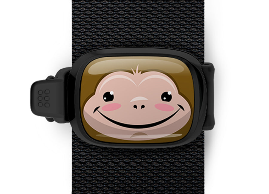 Monkey Bag Tag mounted on a bag strap