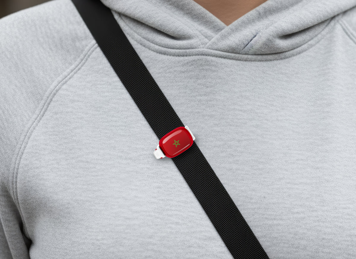 Morocco flag Stwrap bag tag shown on a bag in a lifestyle setting