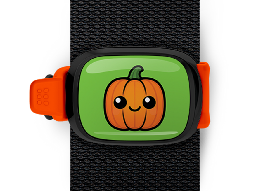 Pumpkin Halloween Bag Tag mounted on a bag strap