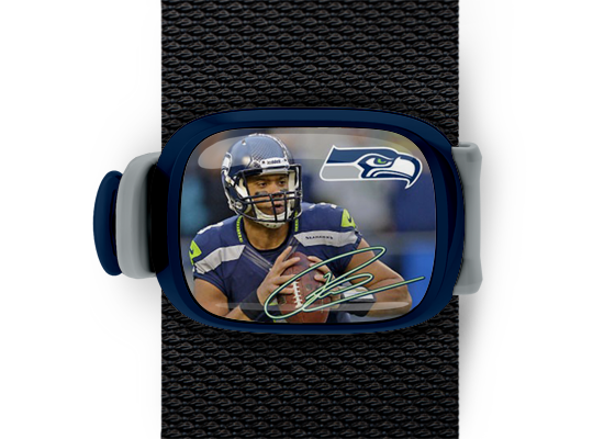 Russell Wilson Bag Tag mounted on a bag strap