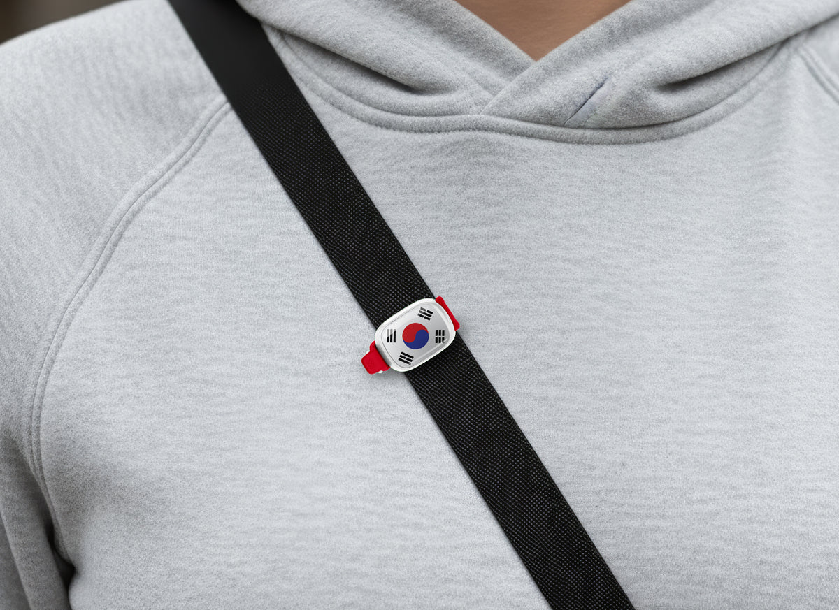 South Korea flag Stwrap bag tag shown on a bag in a lifestyle setting