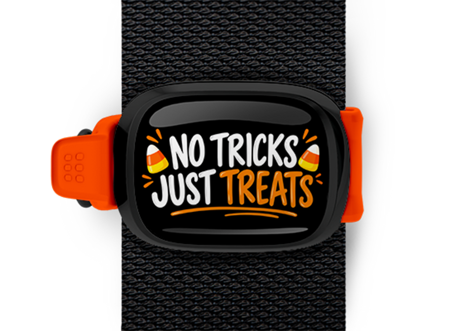 No Tricks, Just Treats Stwrap Halloween bag tag mounted on a black strap