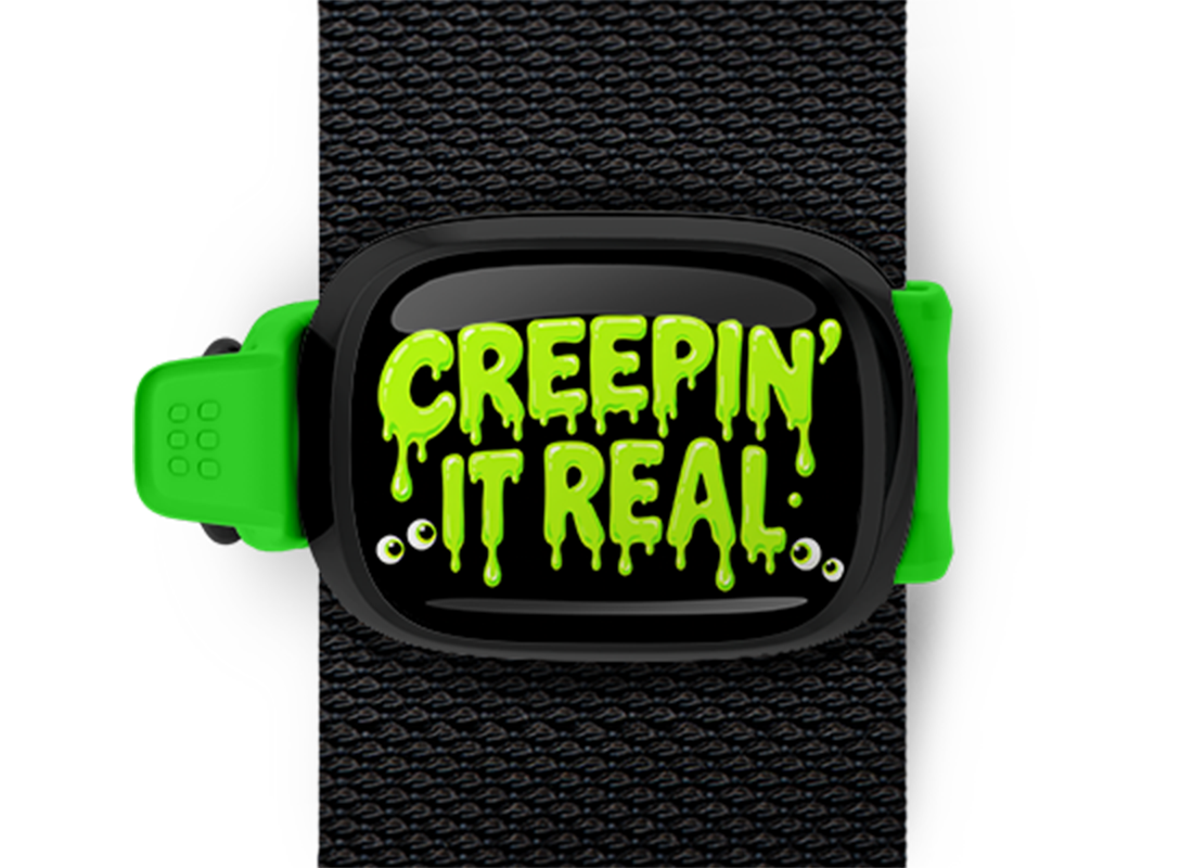 Creepin' It Real Stwrap Halloween bag tag mounted on a black strap