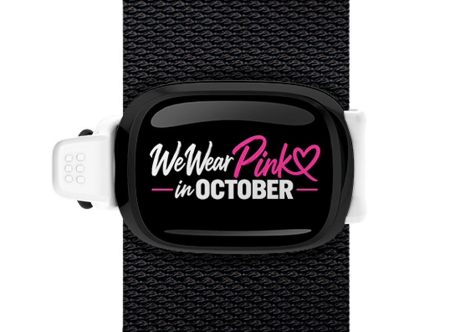 We Wear Pink in October White Band Stwrap bag tag mounted on a bag strap