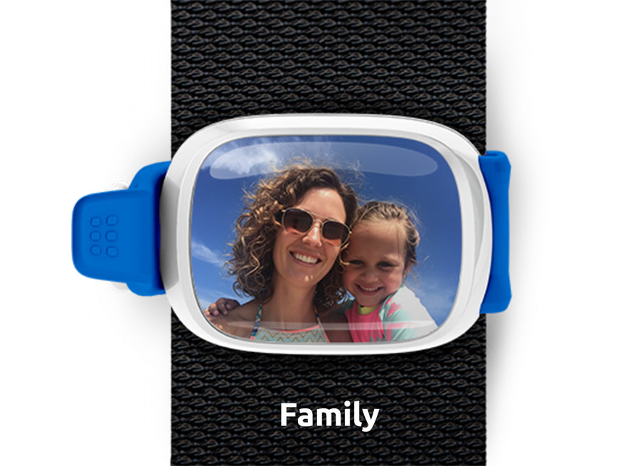Custom family photo Stwrap bag tag mounted flat on a backpack or purse strap.