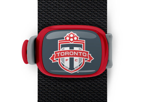 Toronto FC Bag Tag mounted on a bag strap