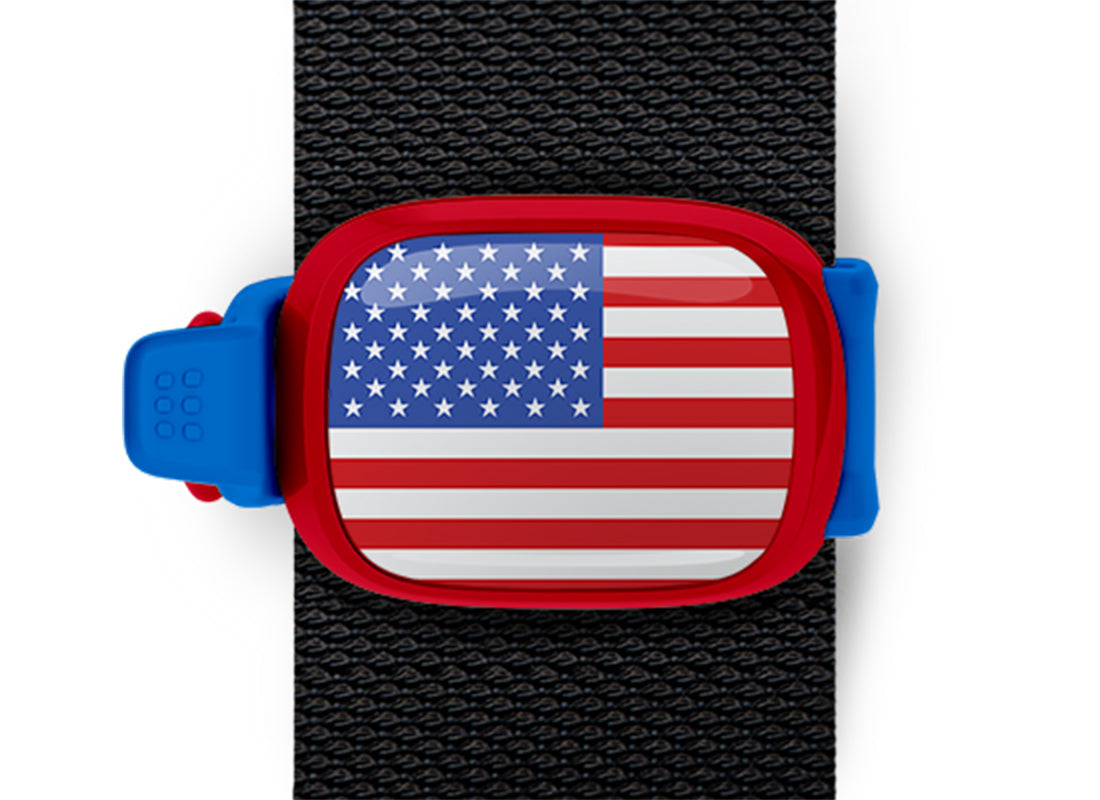 USA flag Stwrap bag tag mounted on a bag strap
