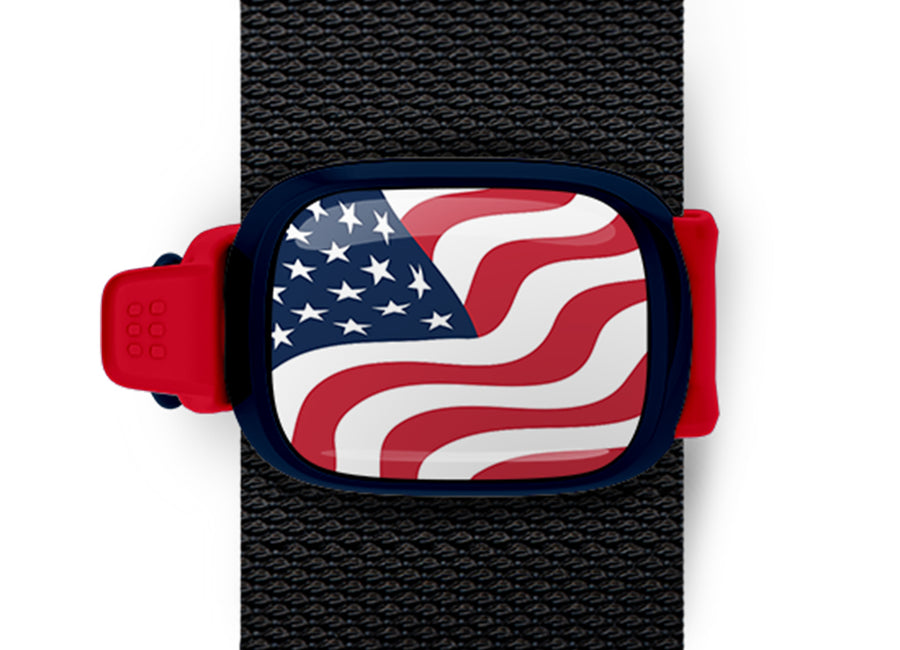 USA Flag Bag Tag mounted on a bag strap
