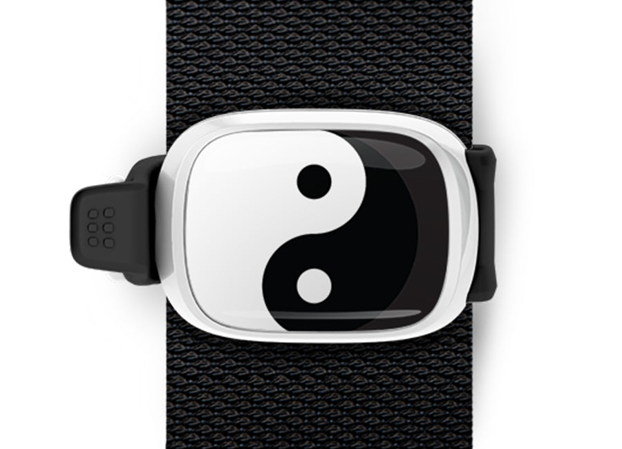 Yin Yang Bag Tag mounted on a bag strap