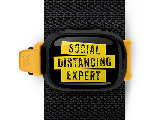 Social Distancing Expert Bag Tag mounted on a bag strap