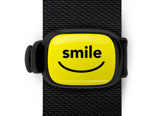 Smile bag tag Stwrap mounted on backpack strap